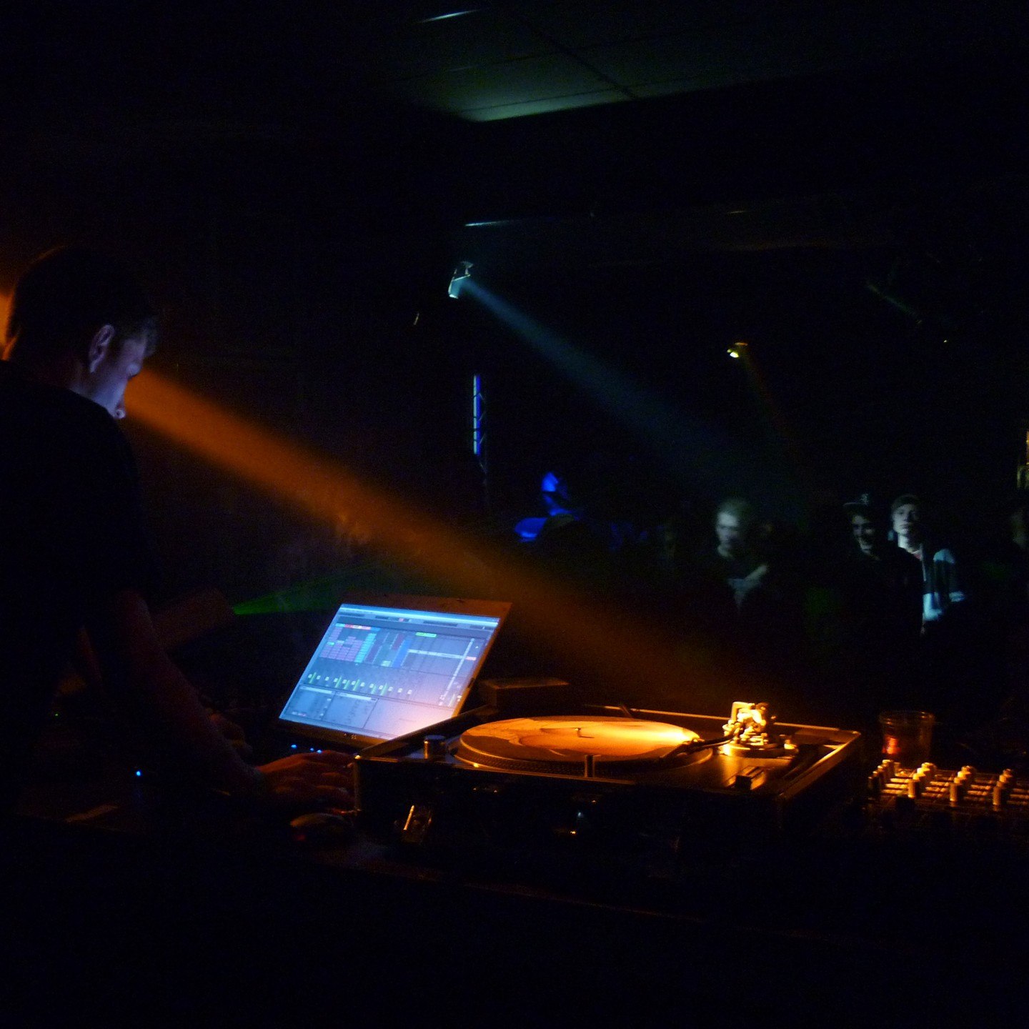 Alextrem performing with a laptop and vinyl turntable